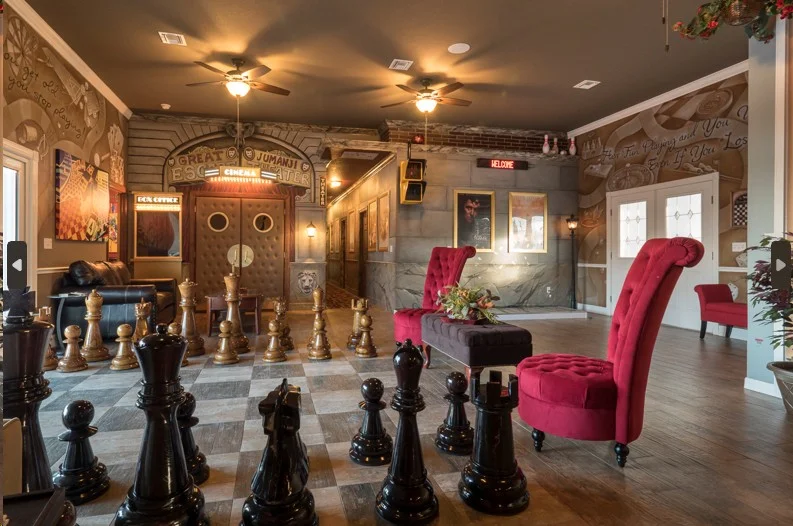 The formal living room of The Great Escape Lakeside - with giant chess